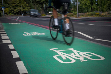 Cyclist using green cycle lane