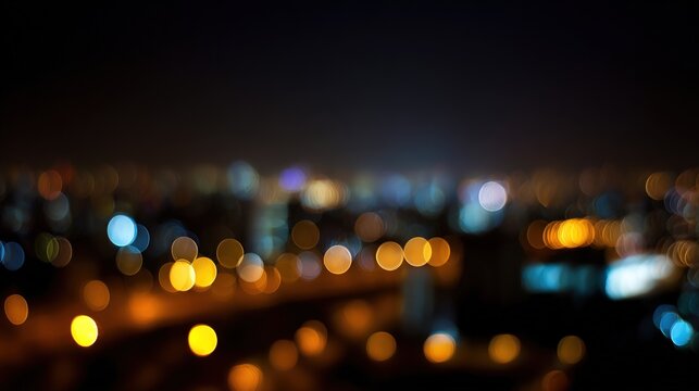 Blurred city lights at night, captured in a photo with an out-of-focus background and a bokeh effect.