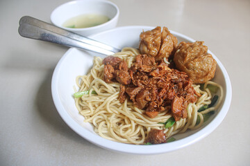 Authentic Indonesian Mie Ayam Bakso: Savory Chicken Noodles with Meatballs