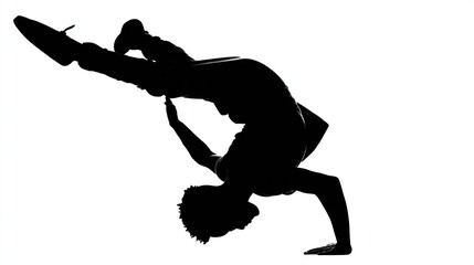 Silhouetted dancer in freeze pose on white, inverted, poised, breakdance move