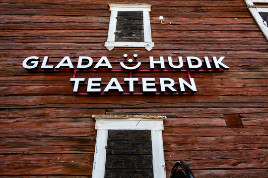 Hudikskvall, Sweden A sign on a red wooden house says Glada Hudik Teatern, or Happy Hudik Theater.