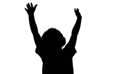 Silhouette of a child with arms raised against a bright, pure white background