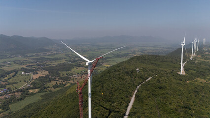 Wind turbines generate electricity at sunset in Europe and Asia
