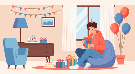 Young Man Celebrating Birthday At Home Sitting With Presents And Balloons