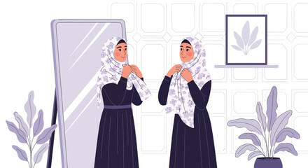 Young Muslim Woman Adjusting Her Hijab In Front Of Mirror At Home