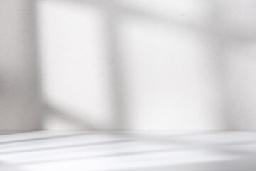 Grey empty room with shadow from window rest on the wall and floor, best for design element background