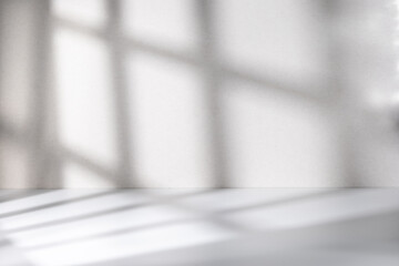 Grey empty room with shadow from window rest on the wall and floor, best for design element background