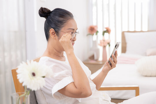 Lifestyle, relaxing, Asian senior woman happiness napping or unwinding peacefully, natural aging glow, mental clarity, elderly with technology smartphone, showing healthy mature lifestyle and wellness