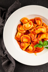 Ravioli beef tomato sauce second course fresh delicious gourmet food background on the table rustic food top view copy space