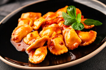 Ravioli beef tomato sauce second course fresh delicious gourmet food background on the table rustic food top view copy space