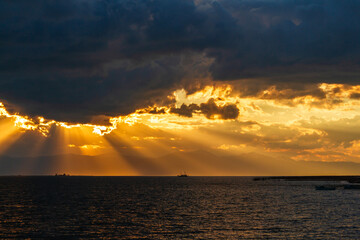 Beyşehir Lake, snowy mountains and the beam of light seen at sunset.