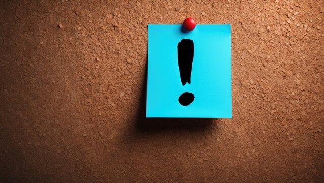 Blue note with exclamation mark pinned on a brown wall.