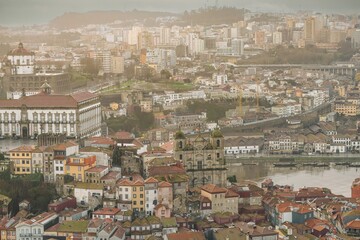 Diverse travelers experience the stunning cityscape. Rooftops stretch toward iconic landmarks like...