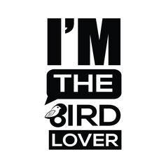 This bold and modern T-shirt design features the statement &ldquo;I&rsquo;M THE BIRD LOVER&rdquo; in an all-uppercase typographic layout. The phrase is broken into distinct blocks for visual impact, 