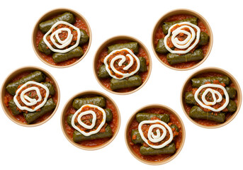 Eight Portions of Grape Leaves Dolmas Isolated on Black Background