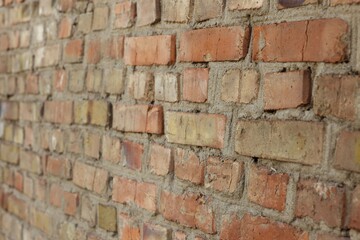 Texture of old red brick wall as background, closeup