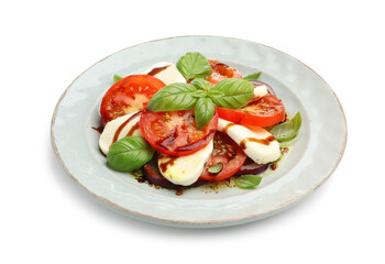 Tasty salad Caprese with mozzarella, tomatoes, basil and spices isolated on white