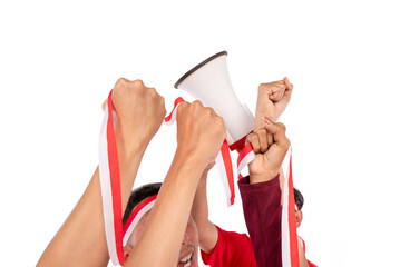 Indonesian southeast asian man celebrating Indonesia Independence Day on 17th August holding...