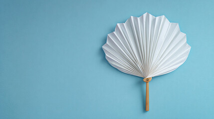 This is an origami folding fan, made of white paper with a wooden handle.