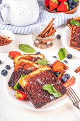 Sweet breakfast cinnamon toasts, buttery sugar cinnamon toast with fresh strawberry and blueberry. Creme Brulee dessert toast recipe for summer breakfast