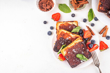Sweet breakfast cinnamon toasts, buttery sugar cinnamon toast with fresh strawberry and blueberry....