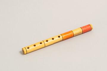 Wooden Flute isolated on grey background