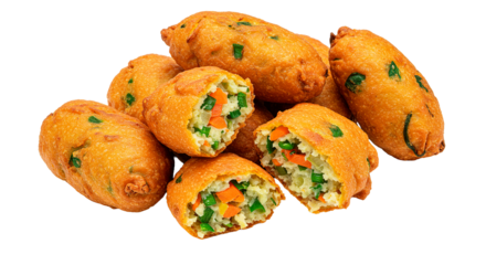 A pile of golden brown vegetable fritters with visible carrots and green onions on a black background