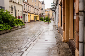 Old European Street Scene In Action In A Polish Town. Soft focus