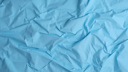 Obraz premium Abstract Texture of Wrinkled Blue Paper, Minimalist Crumpled Blue Paper Background for Design