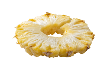 Close-up of a sliced pineapple ring, pale yellow flesh,  showing the concentric layers of the fruit, against a black background
