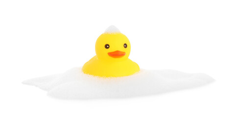 One cute rubber duck and foam isolated on white