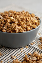 Healthy Homemade Toasted Muesli with Nuts in a Bowl, side view. Close-up.