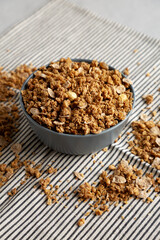 Healthy Homemade Toasted Muesli with Nuts in a Bowl, side view.