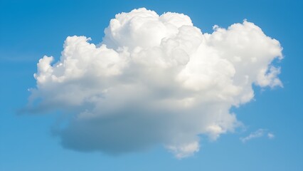 Obraz premium Fluffy Cumulus Cloud Isolated Against Azure Summer Sky