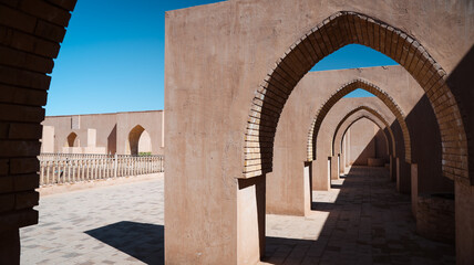 Exploring ancient architecture in Samarra Iraq under bright blue skies