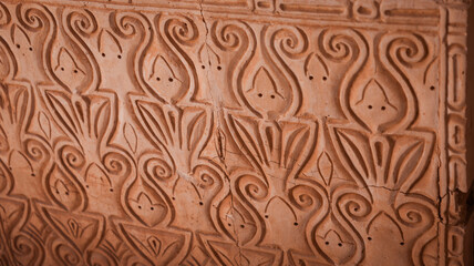 Ornate wall carvings in Samarra highlight ancient craftsmanship and design elements