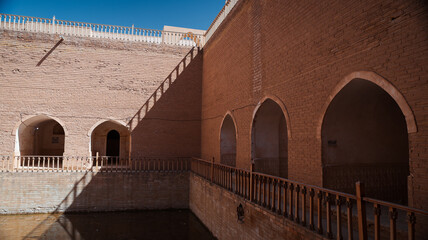 Historic architecture showcases traditional design in Samarra Iraq by the water edge