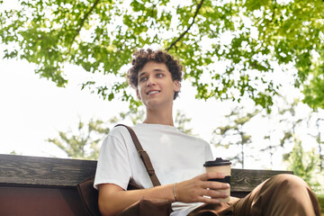 Relaxing in the park on a warm summer day while enjoying a drink