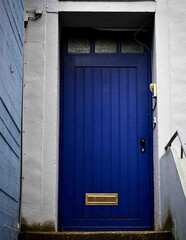 Lonely Blue Door at the top of Stairs