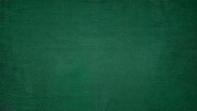 A textured deep emerald green background with subtle variations in tone and a slightly distressed vintage feel perfect for design