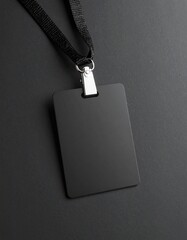 Sleek blank black badge with lanyard and clip, offering a concept of identity and access control for corporate events, conferences, and secure facilities.
