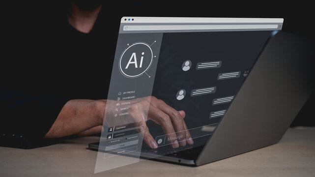 A person interacts with a futuristic transparent AI interface projected from a laptop, displaying chat messages and AI-related icons in a dark setting.