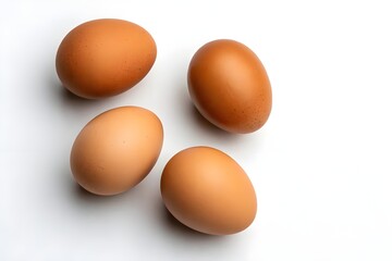 Five brown eggs on white background