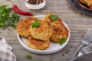 Chicken cutlets from minced meat. Pan-fried meat fritters. Healthy dinner for the family.