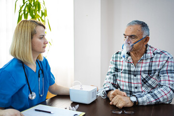 Elderly man receives respiratory treatment with care