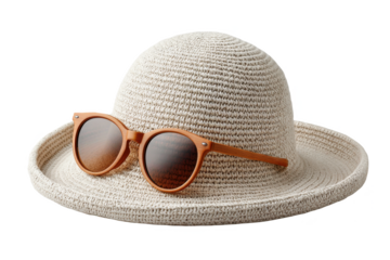 A beige woven straw sunhat paired with brown-framed sunglasses featuring dark tinted lenses.