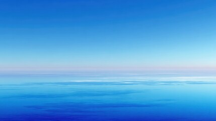 Obraz premium A serene seascape showcasing endless blue waters meeting a clear sky, perfect for tranquility and relaxation themes.