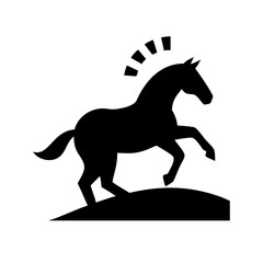 Fototapeta premium Silhouette of Horse Running on Hill at Sunrise