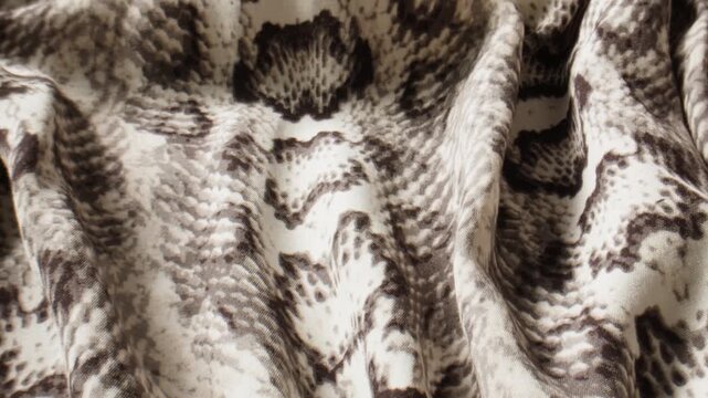 Discover the Elegant Python Print Fabric, perfect for your Fashion and Design Creations