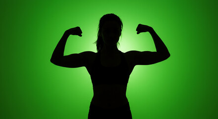 Silhouette of a Strong Woman Flexing Muscles on Green Background